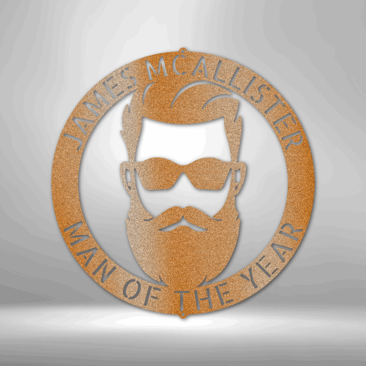 Circular metal plaque featuring a stylized bearded face with sunglasses and text reading ’The McAllister Man of the Year’.