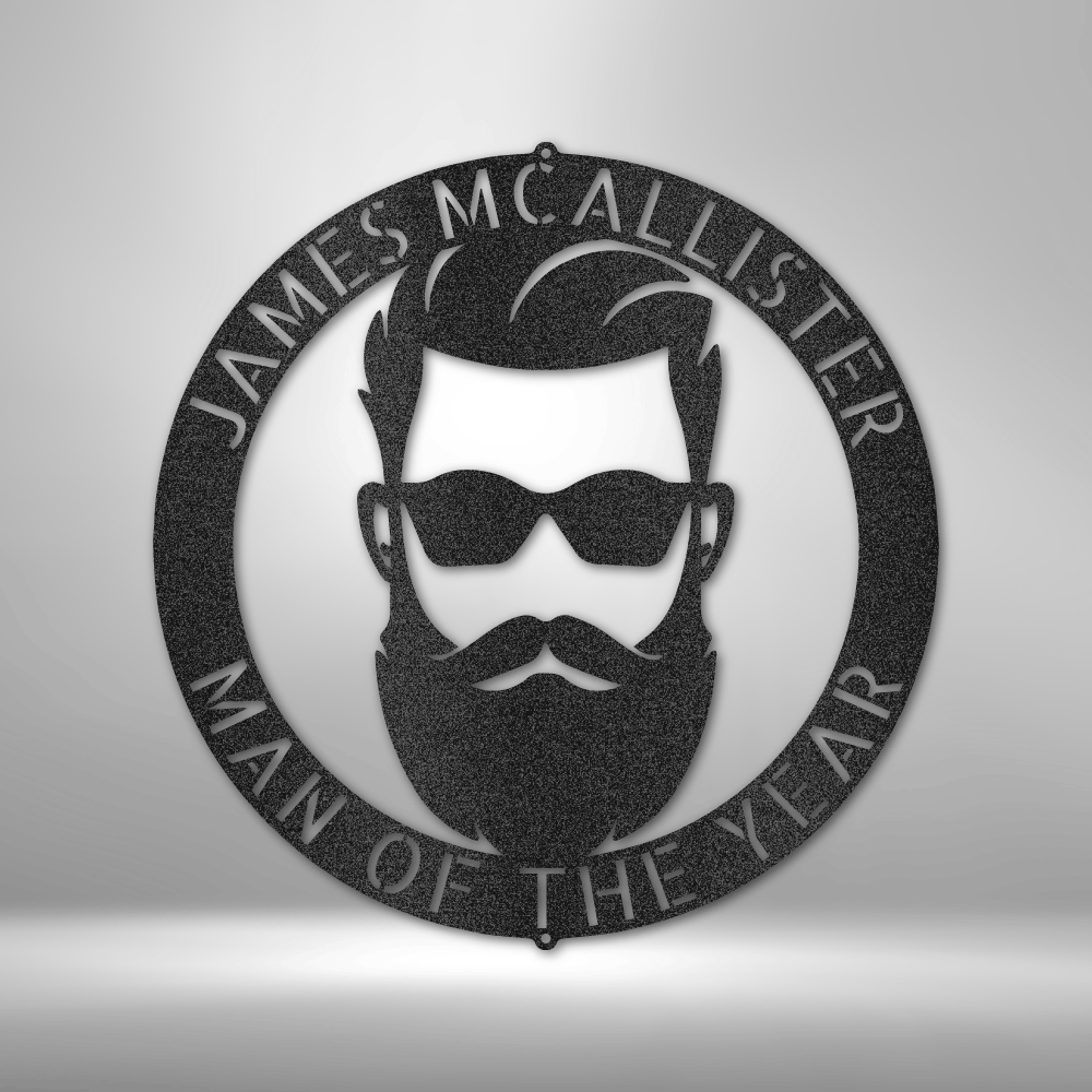 Circular plaque featuring a stylized male face with sunglasses, beard, and text ’James McAllister Man of the Year’.