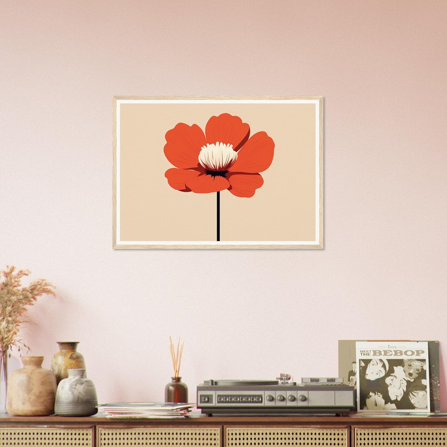 Framed artwork of a single red poppy flower against a light background.