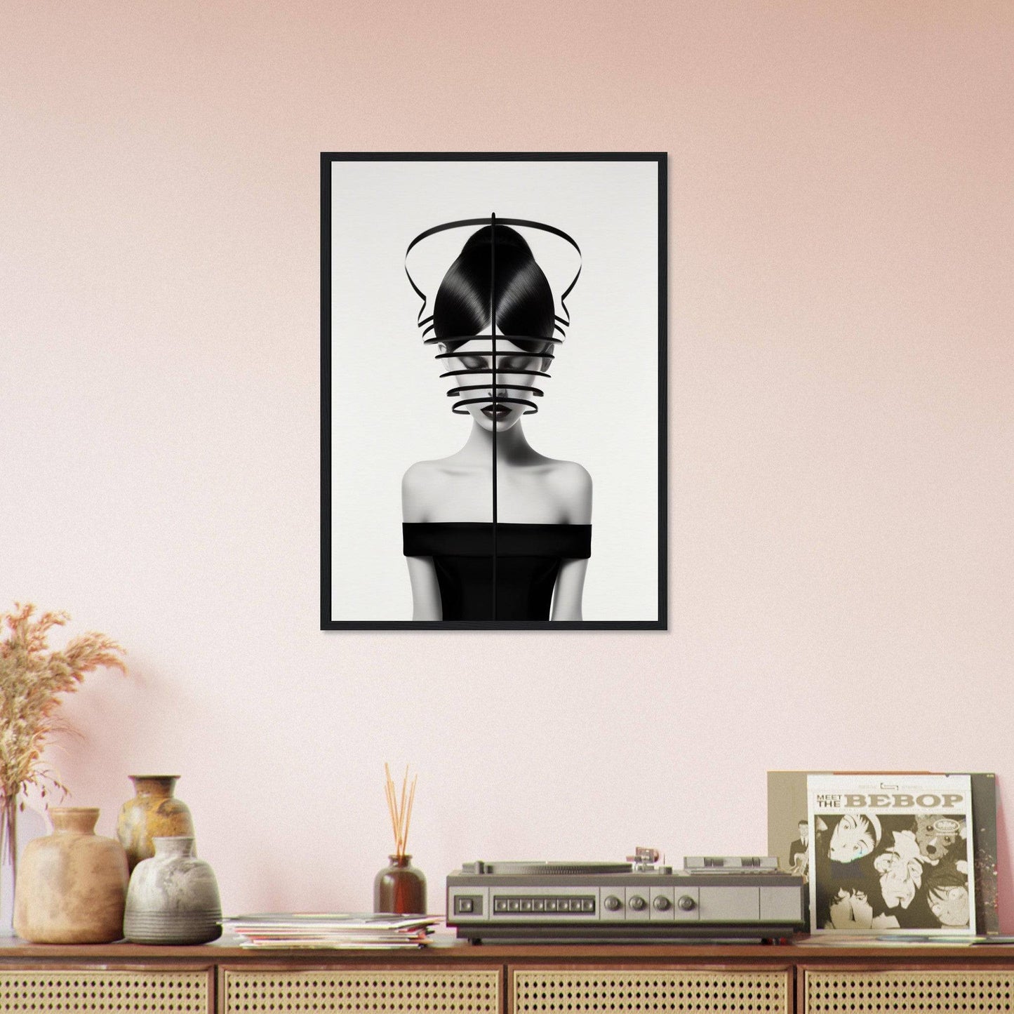 Framed black and white surrealist portrait of a figure with an obscured face.