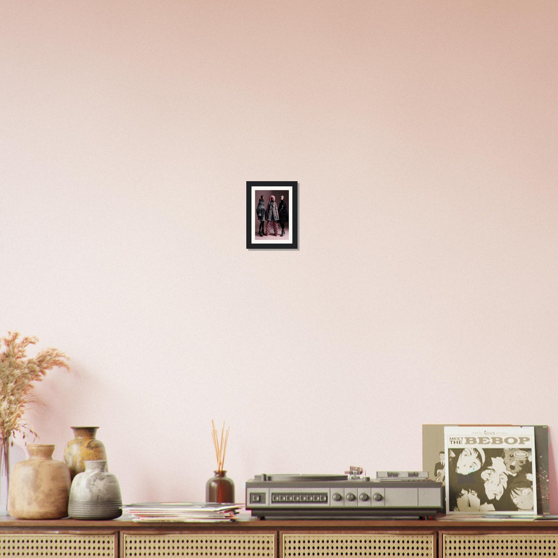 Vintage stereo receiver on a wooden console table with decorative objects.