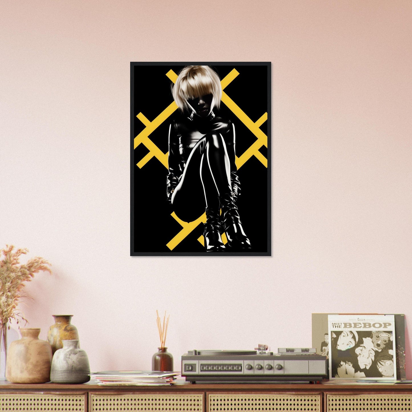 Framed artwork featuring a silhouetted figure against a black background with yellow X patterns.