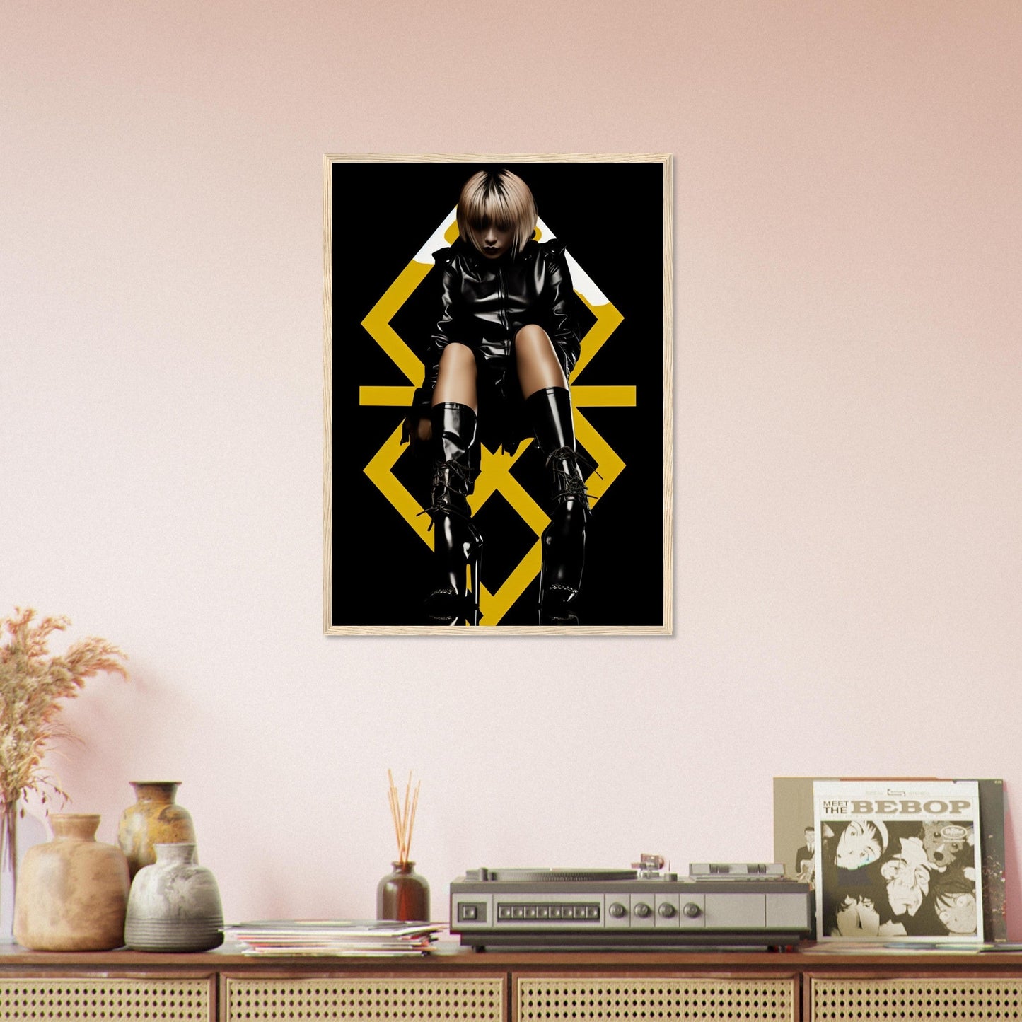 Framed poster featuring a person in black clothing against a geometric yellow design.