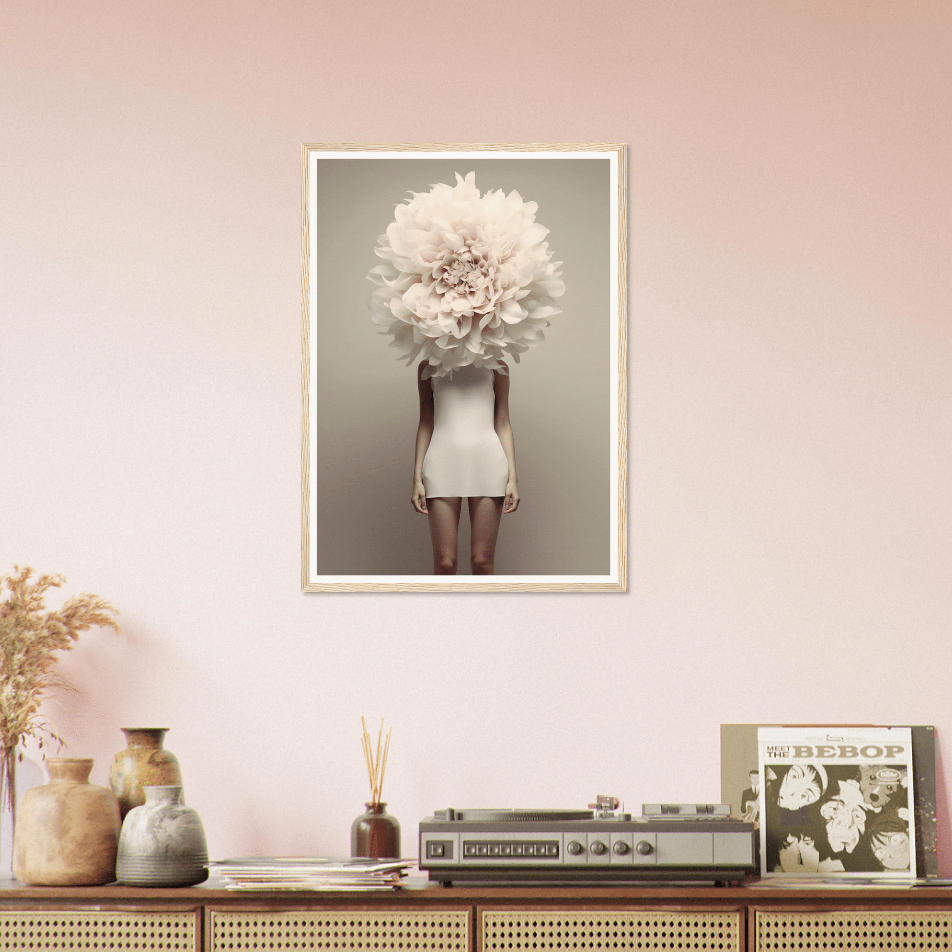 Framed surrealist photograph of a figure with a giant white flower for a head, wearing a short white dress.