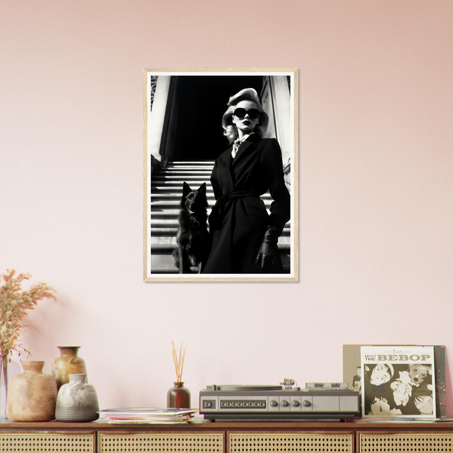 Black and white photograph of a woman in a coat and hat descending stairs.