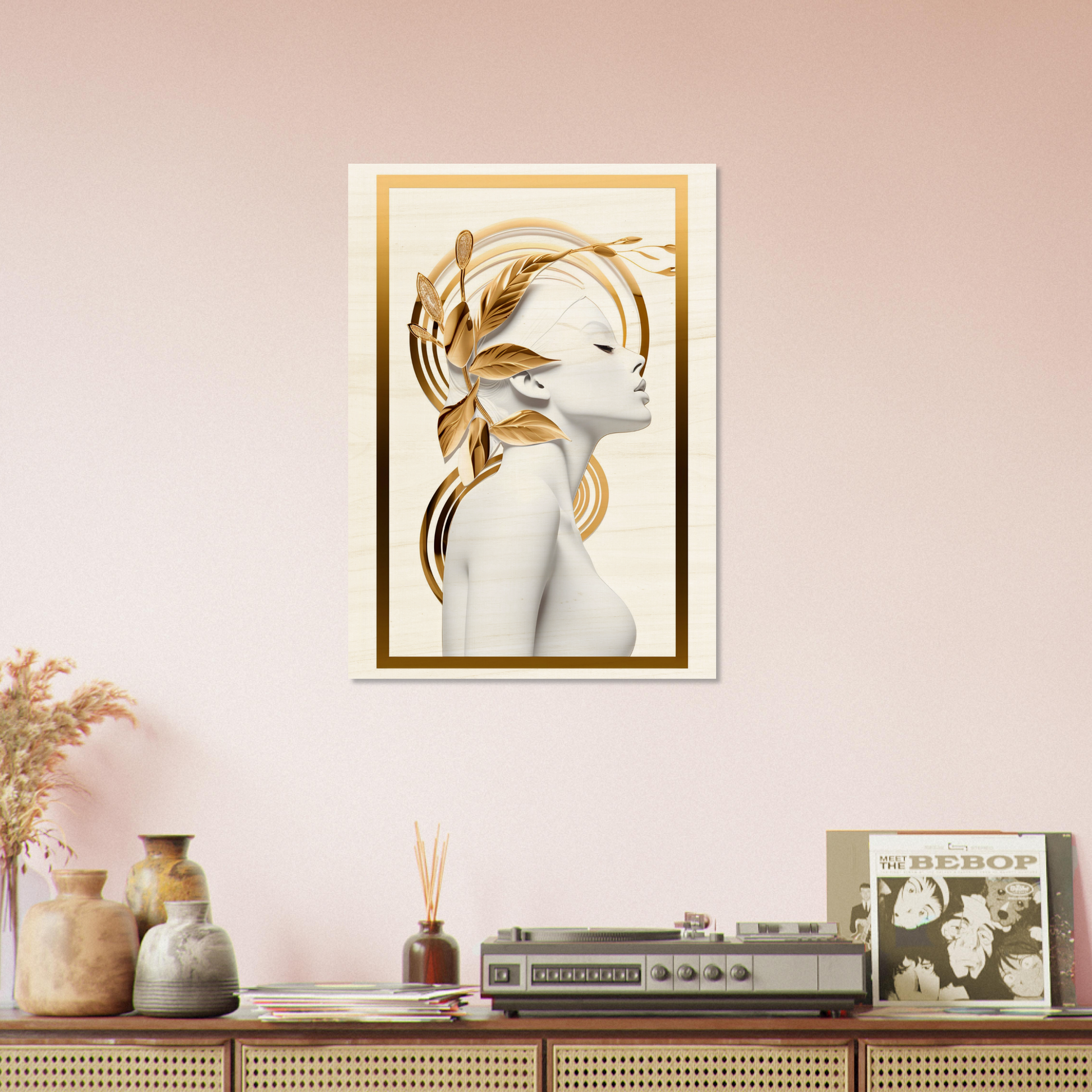 Framed artwork depicting a stylized portrait of a woman with golden accents.