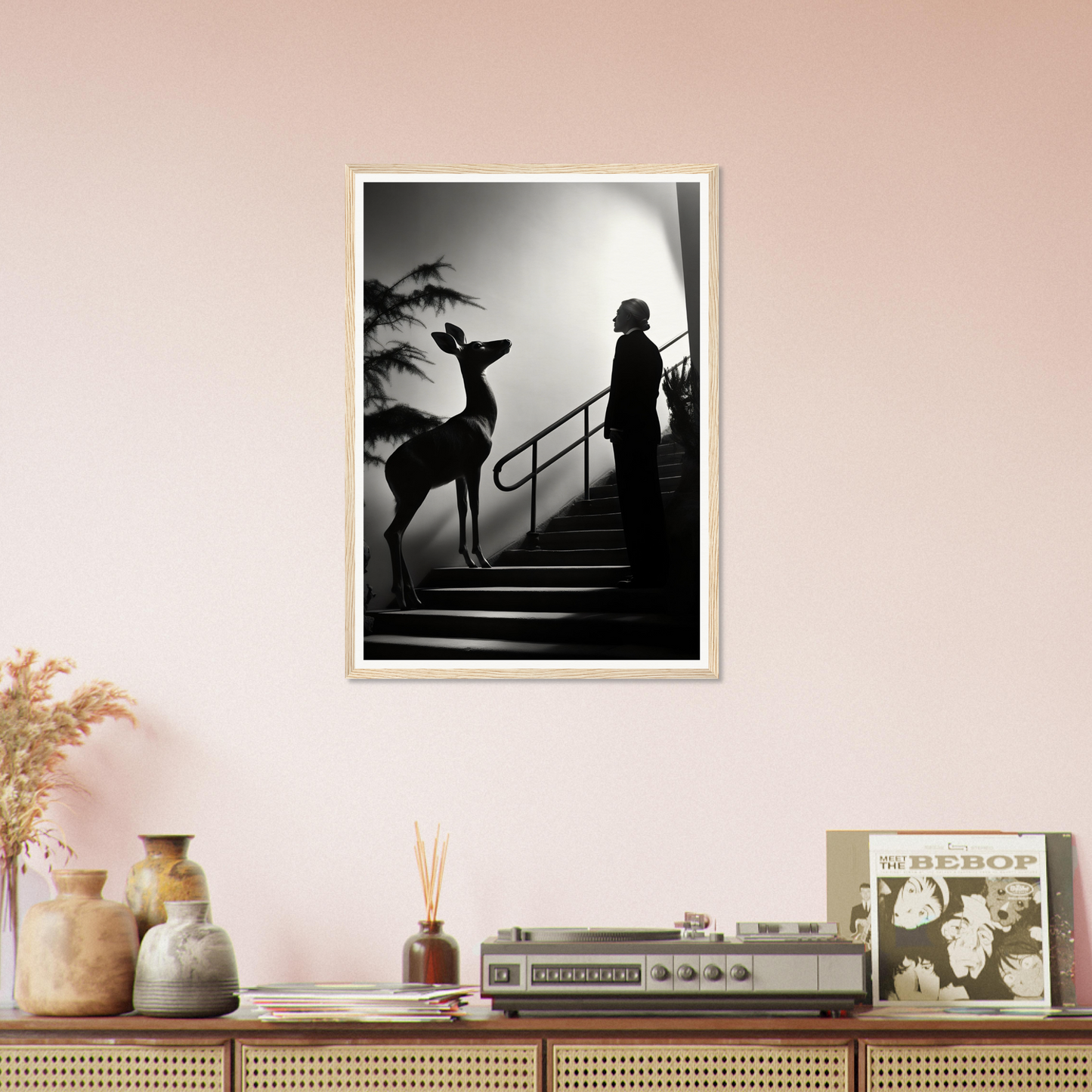 Black and white surrealist photograph showing a silhouetted figure ascending stairs alongside a deer.