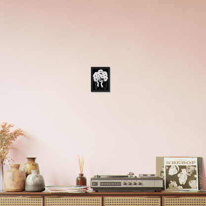 Wooden console table with decorative items including vases, a vintage radio, and framed artwork.