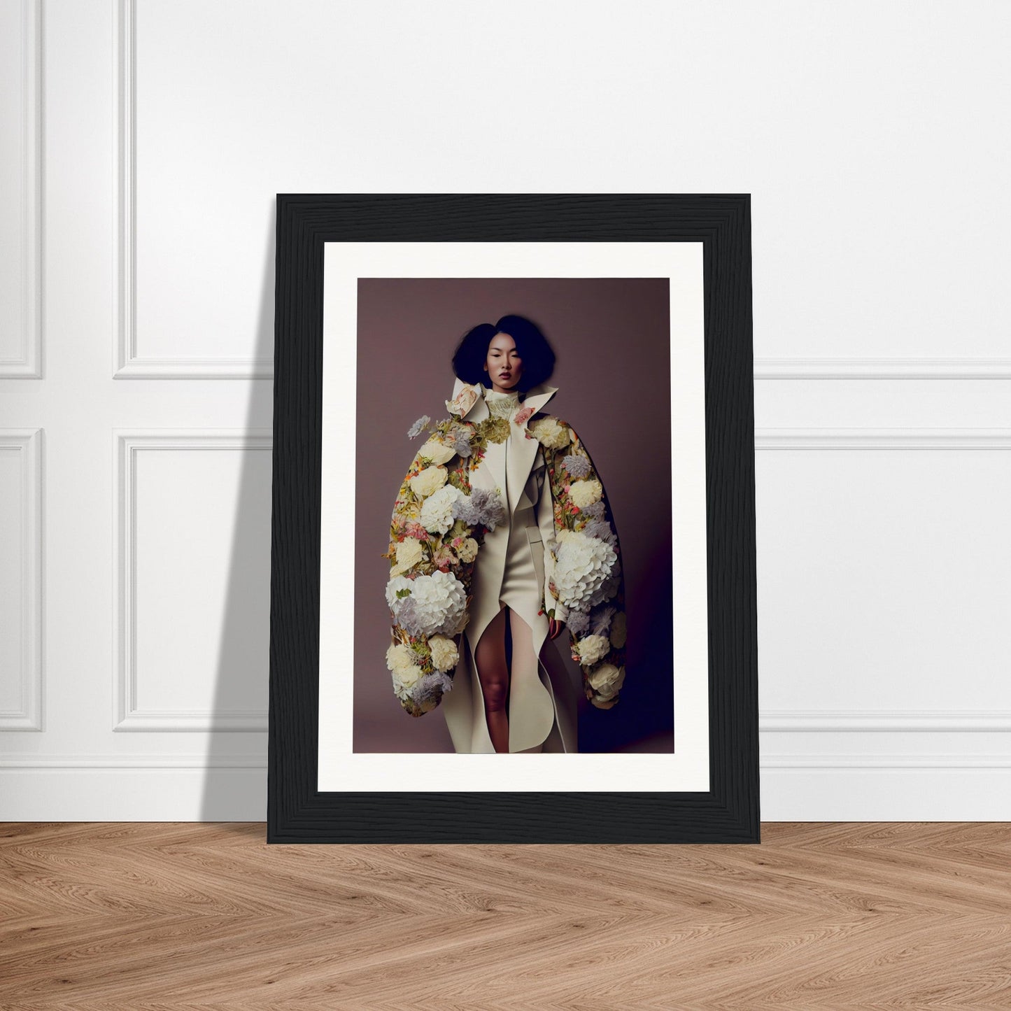 Framed photograph of a person wearing an elaborate floral coat.