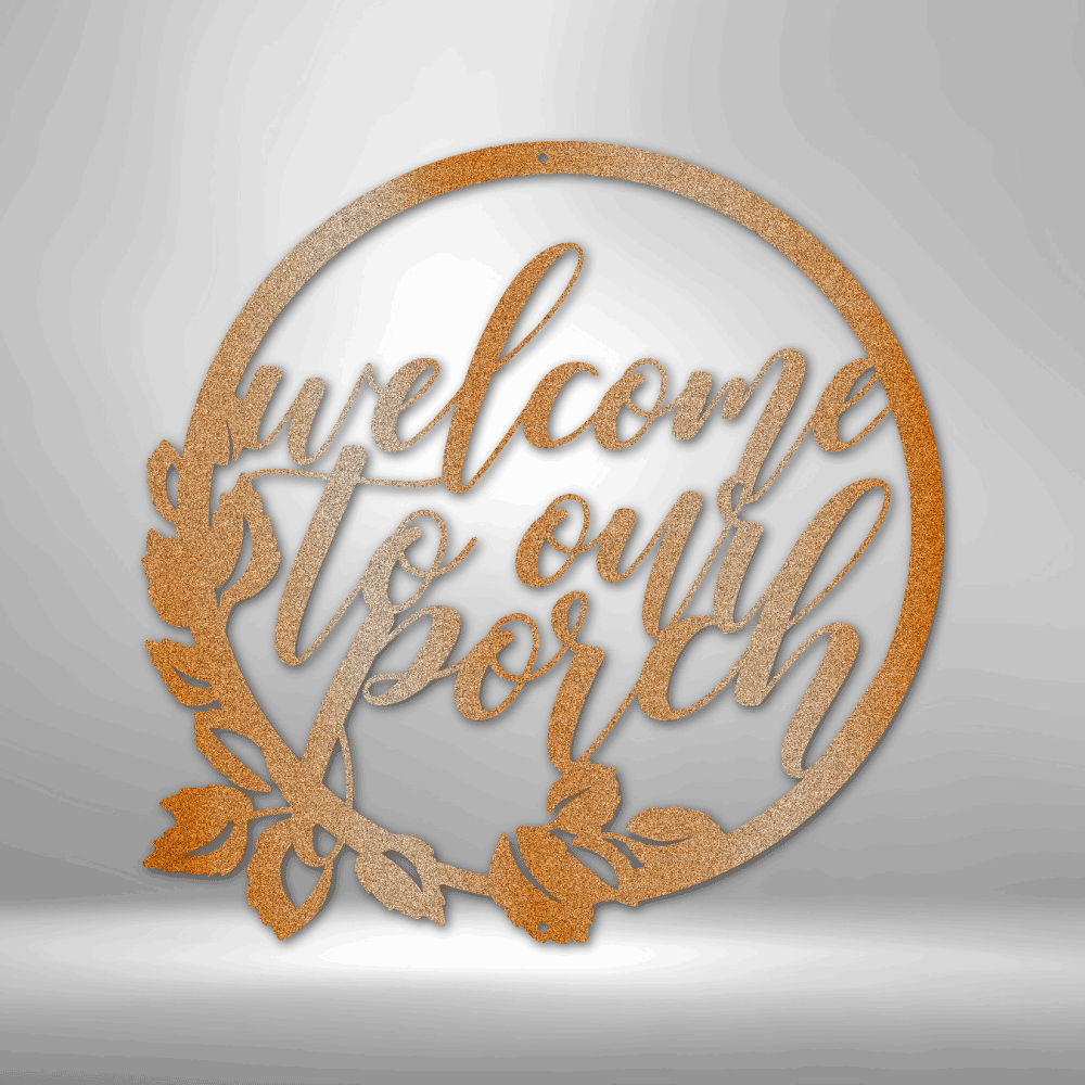 Circular wooden sign with the phrase ’welcome to our porch’ in cursive lettering, adorned with decorative leaves.