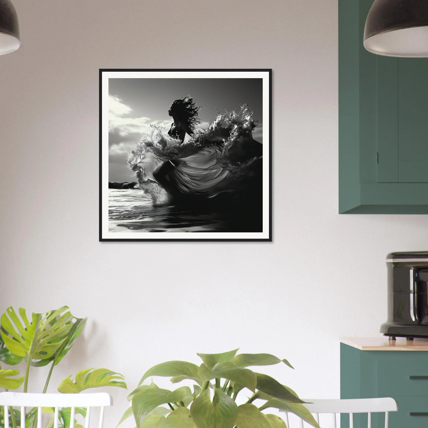 Framed black and white art of Ocean’s Dancer in flowing fabric by water and sky