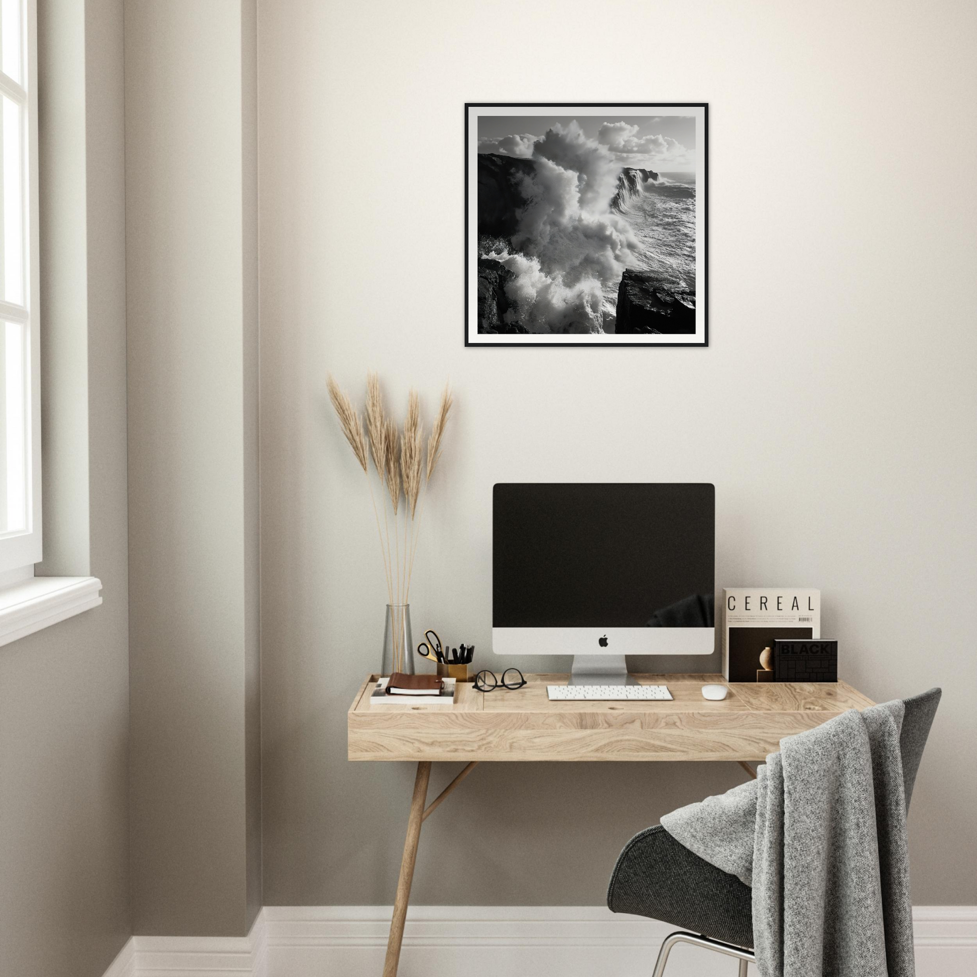 Minimalist wooden desk with iMac and Ocean’s Mighty Whisper artwork above it