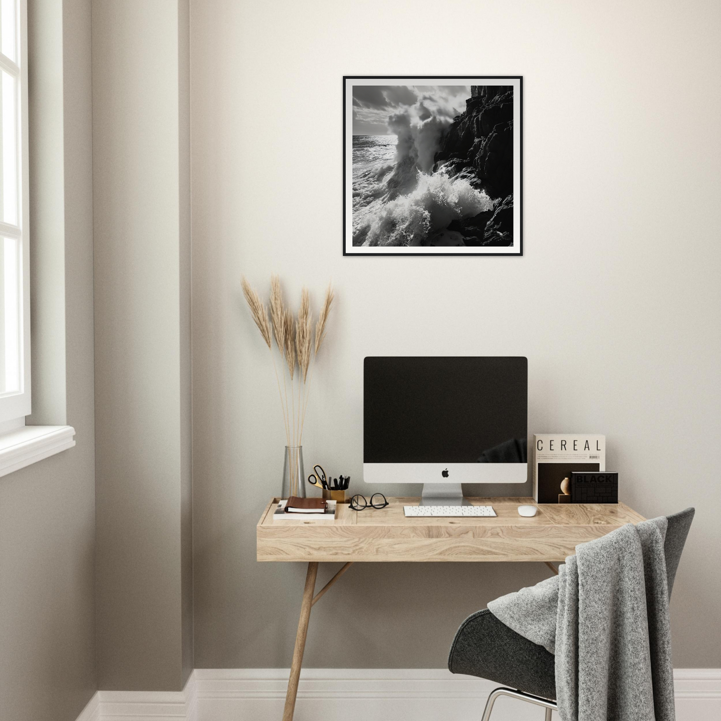 Minimalist wooden desk with iMac and pampas grass inspired by Ocean’s Unyielding Fury