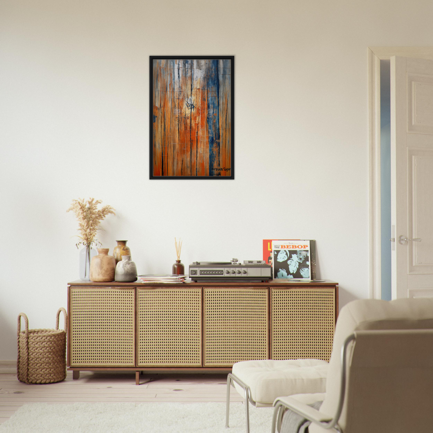 Wooden sideboard with rattan-style doors and decor, featured in Orange Blue Spectrums