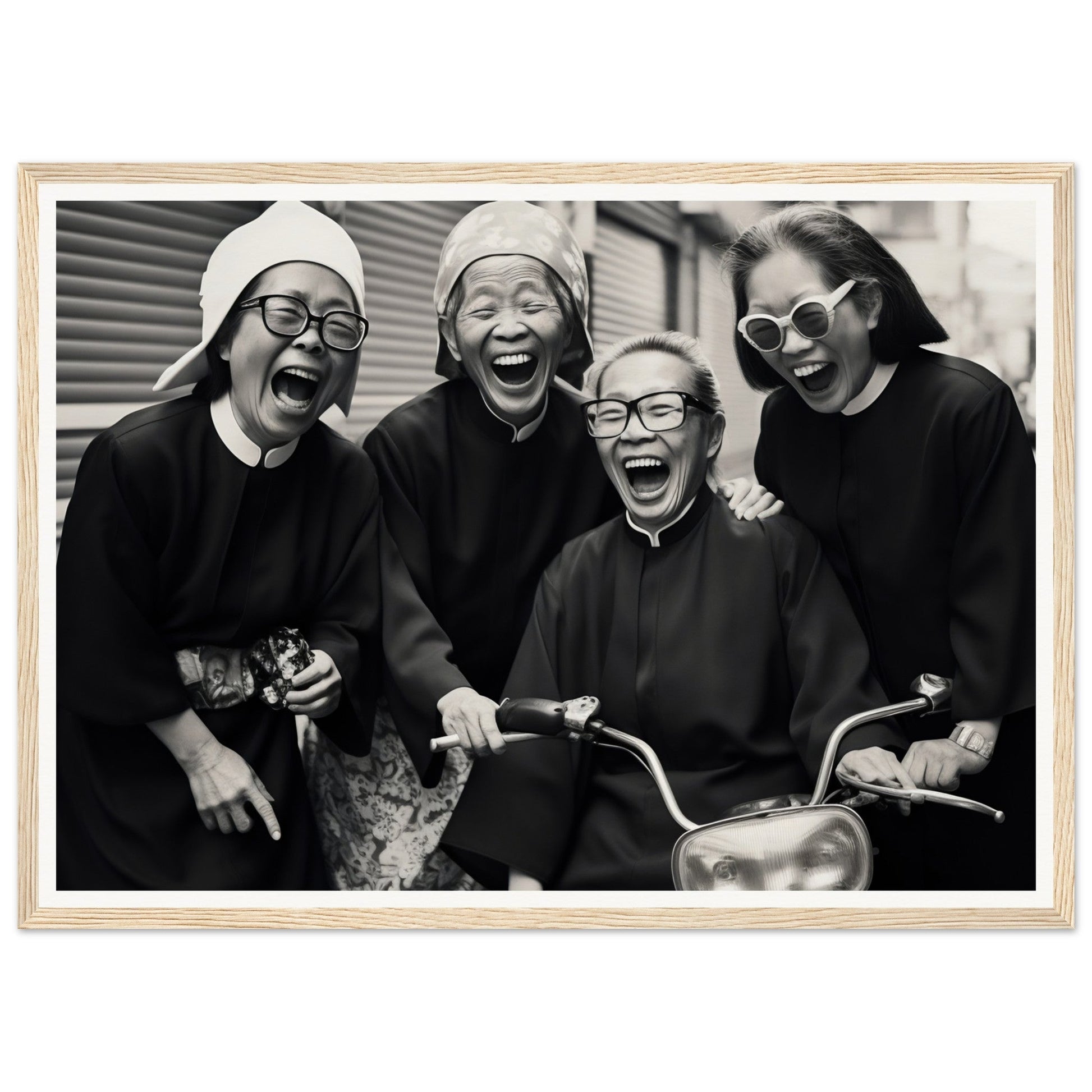Black and white photograph of four joyful women, likely nuns, laughing together on a motorcycle or scooter.