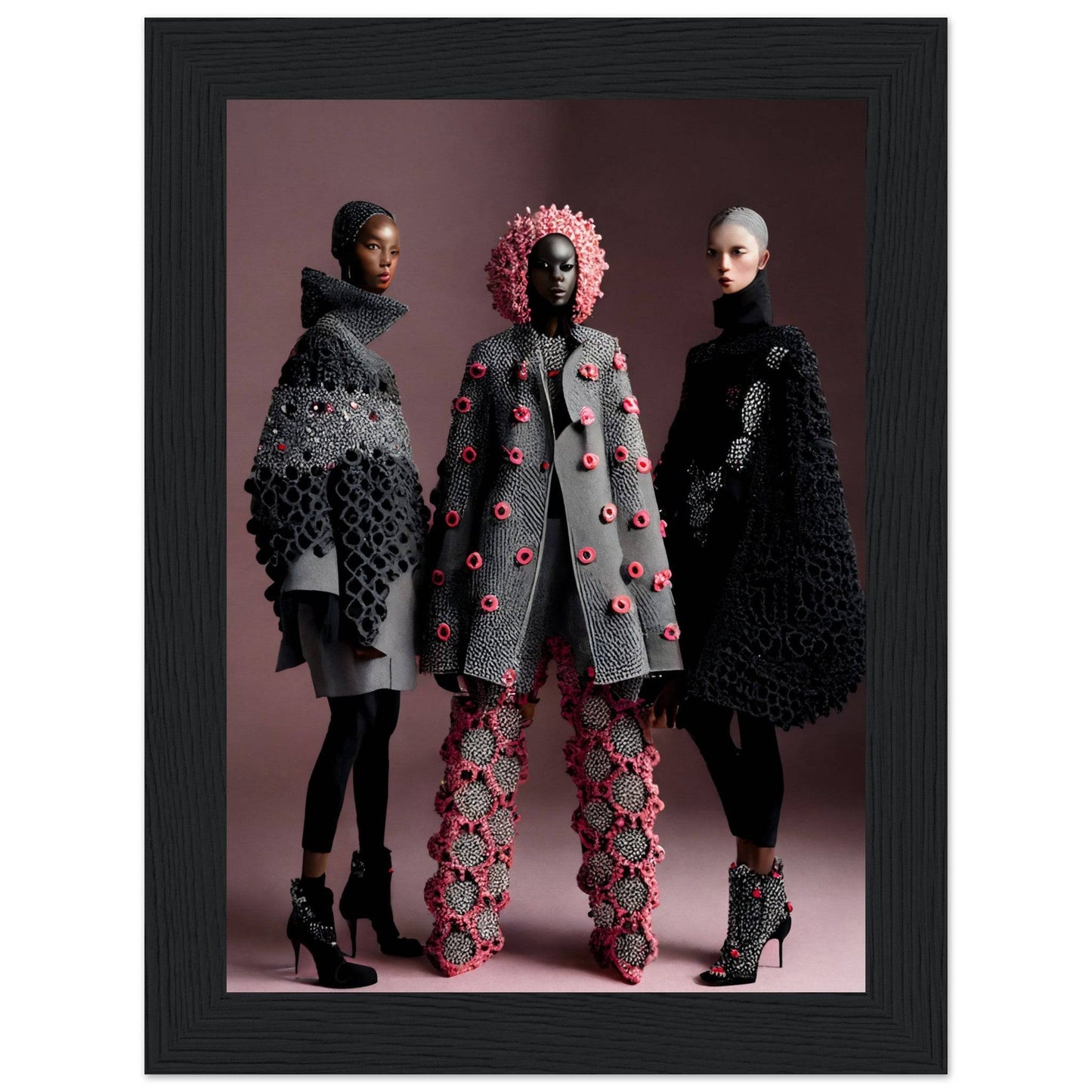 Three models wearing avant-garde, textured outerwear in black and gray with pink floral accents.