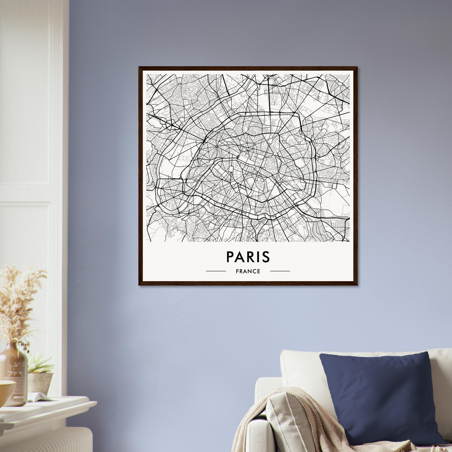 Framed map of Paris showing the city’s street layout and major landmarks.