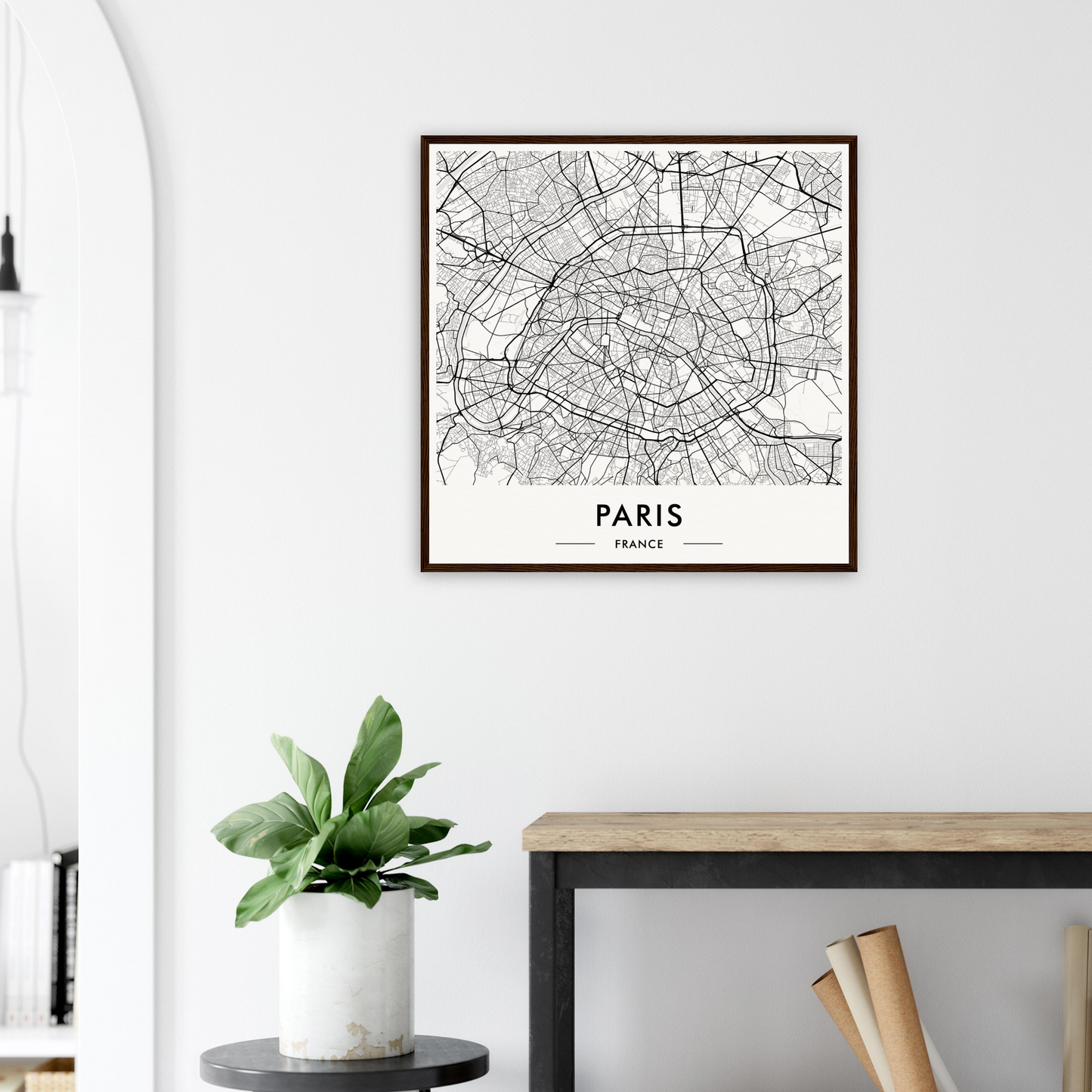 Framed map of Paris showing the city’s street layout and major landmarks.