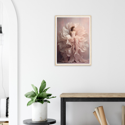 Framed artwork depicting a figure in flowing, ethereal fabric against a soft, rosy background.