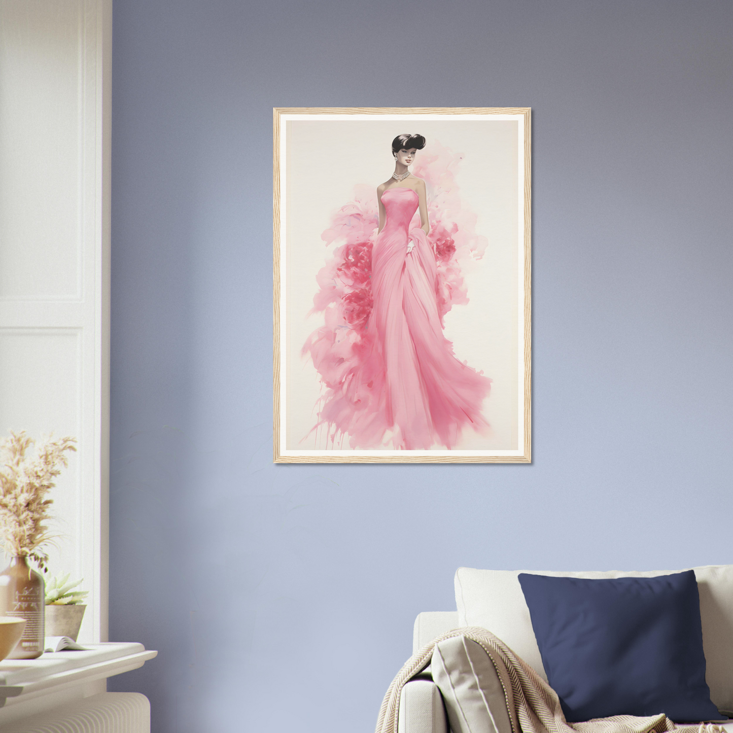 A pink dress hanging on a wall