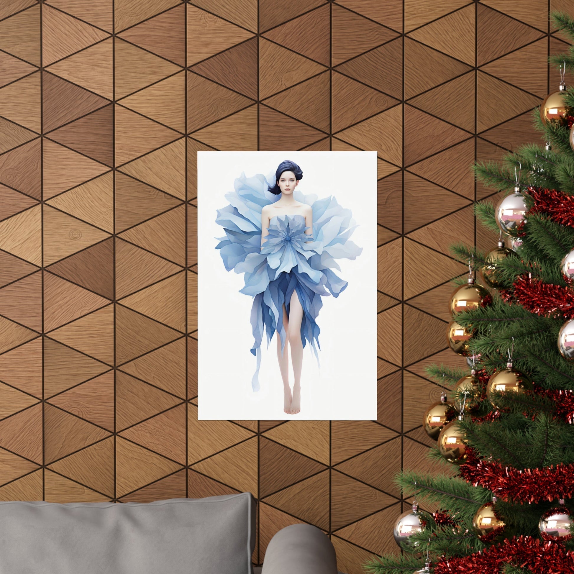 A christmas tree with a blue dress on it