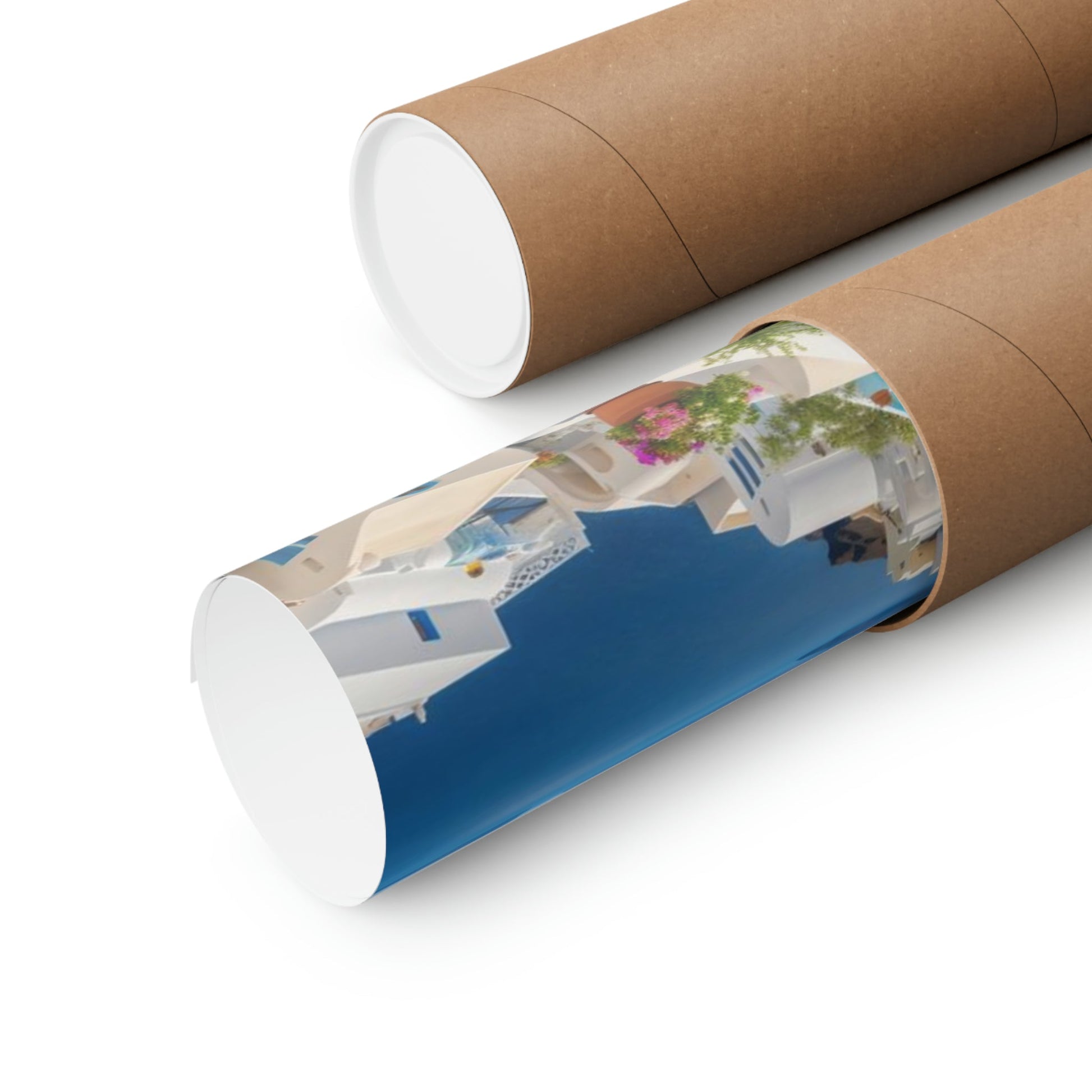 Cardboard mailing tubes, one containing a rolled-up image of a coastal scene.