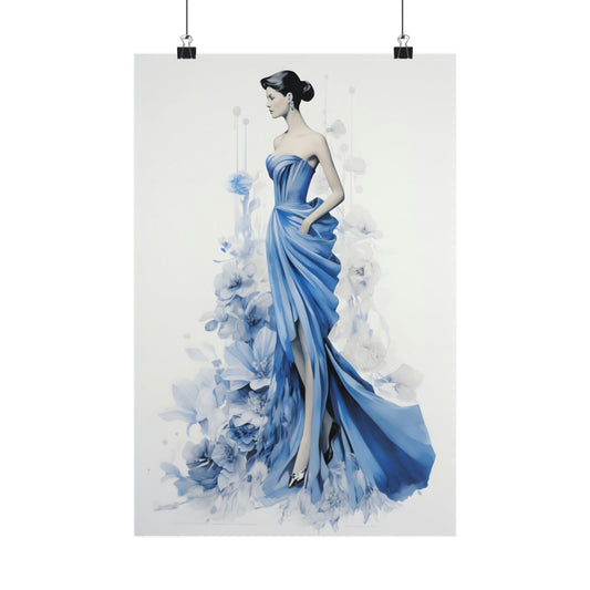 Elegant woman in a flowing blue evening gown with a strapless bodice and dramatic silhouette.