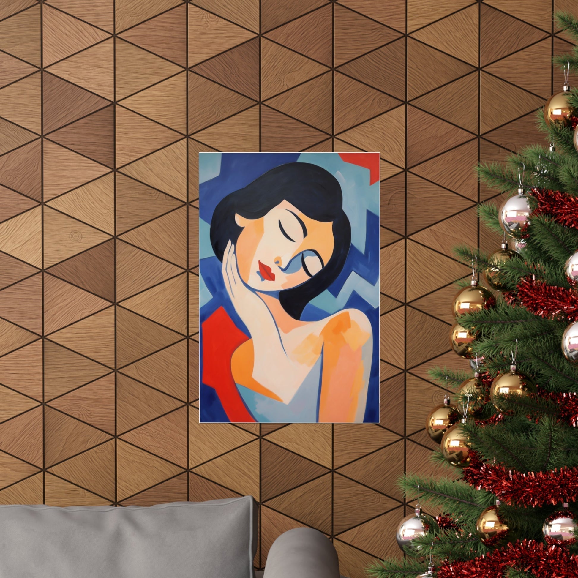 A christmas tree with a painting of a woman