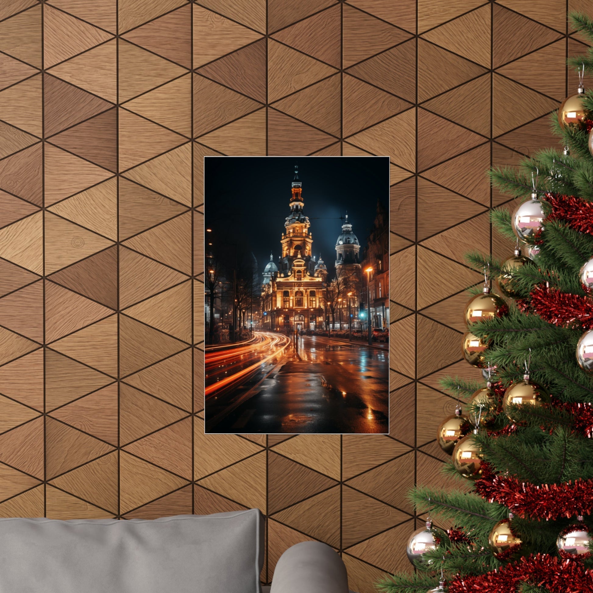 Framed nighttime cityscape photograph hanging on a geometric patterned wall.