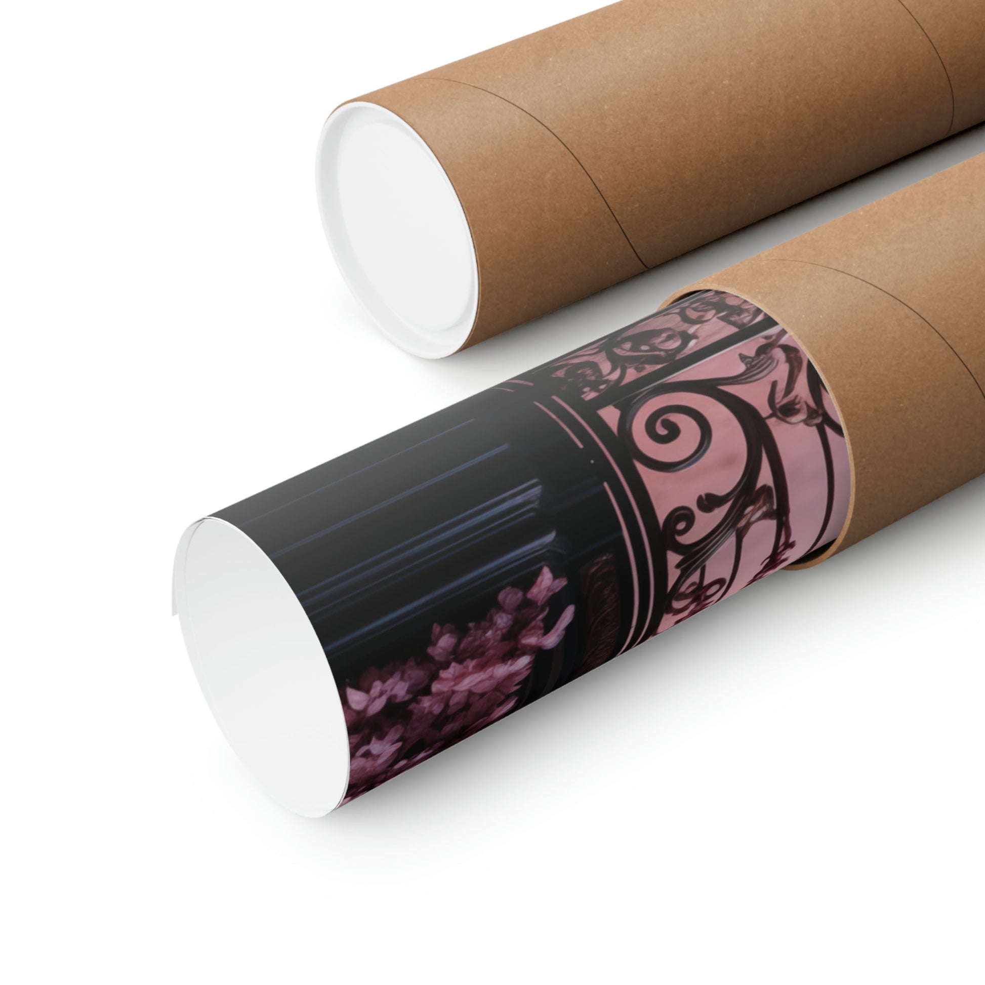 Cardboard mailing tubes, one plain and one decorated with a pink and black ornate design.