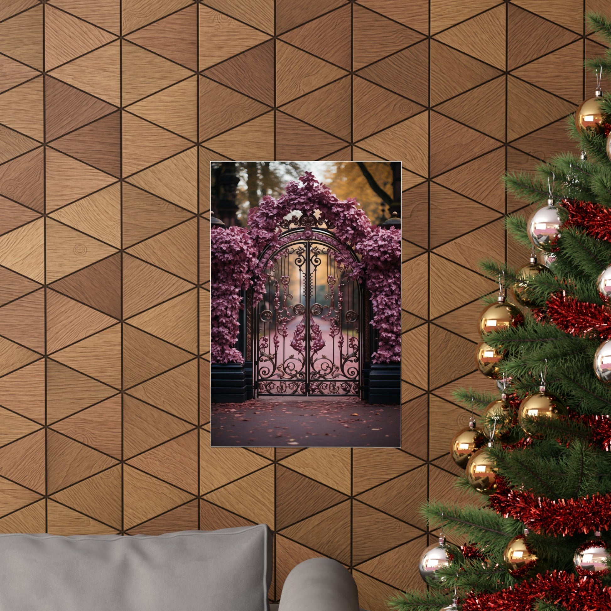 Decorated Christmas tree next to a wall with a framed picture of a floral-covered gate.