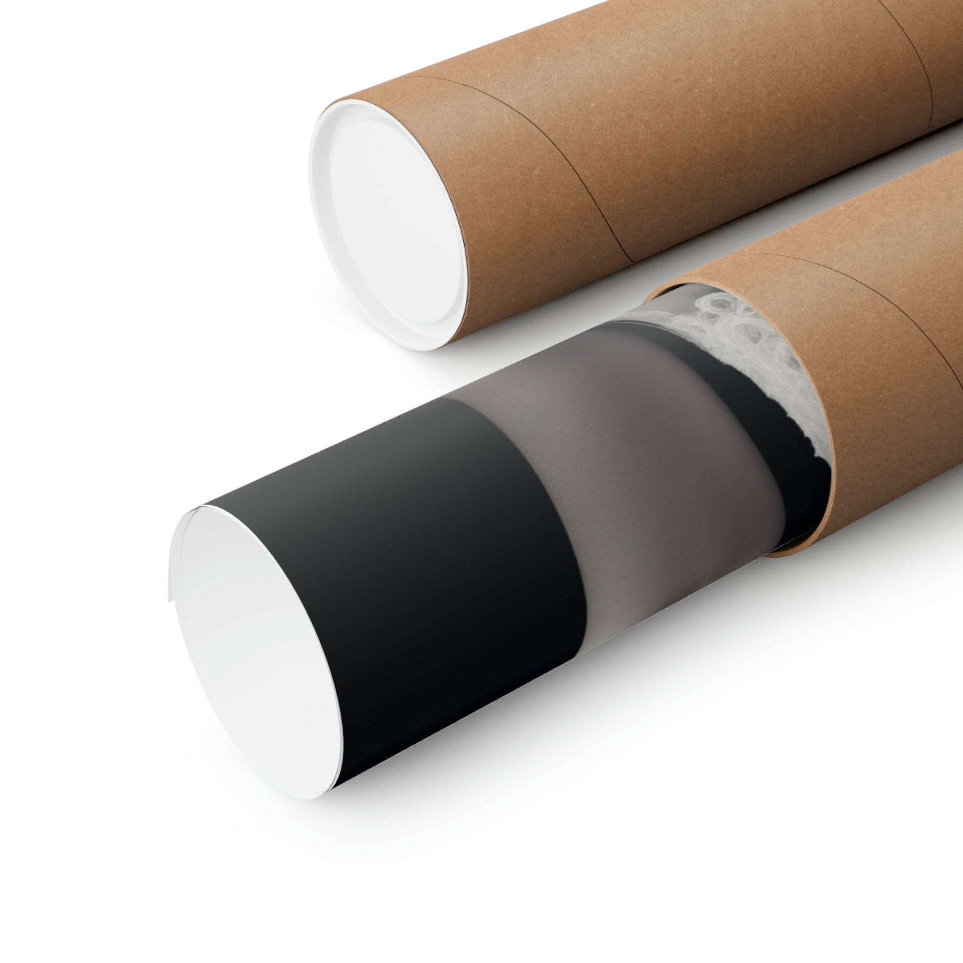 Two rolls of brown paper with black and white paper