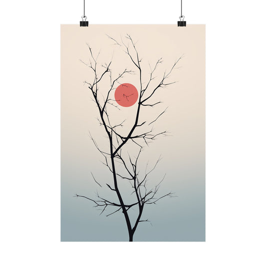 Bare tree branches silhouetted against a pale sky with a red sun.