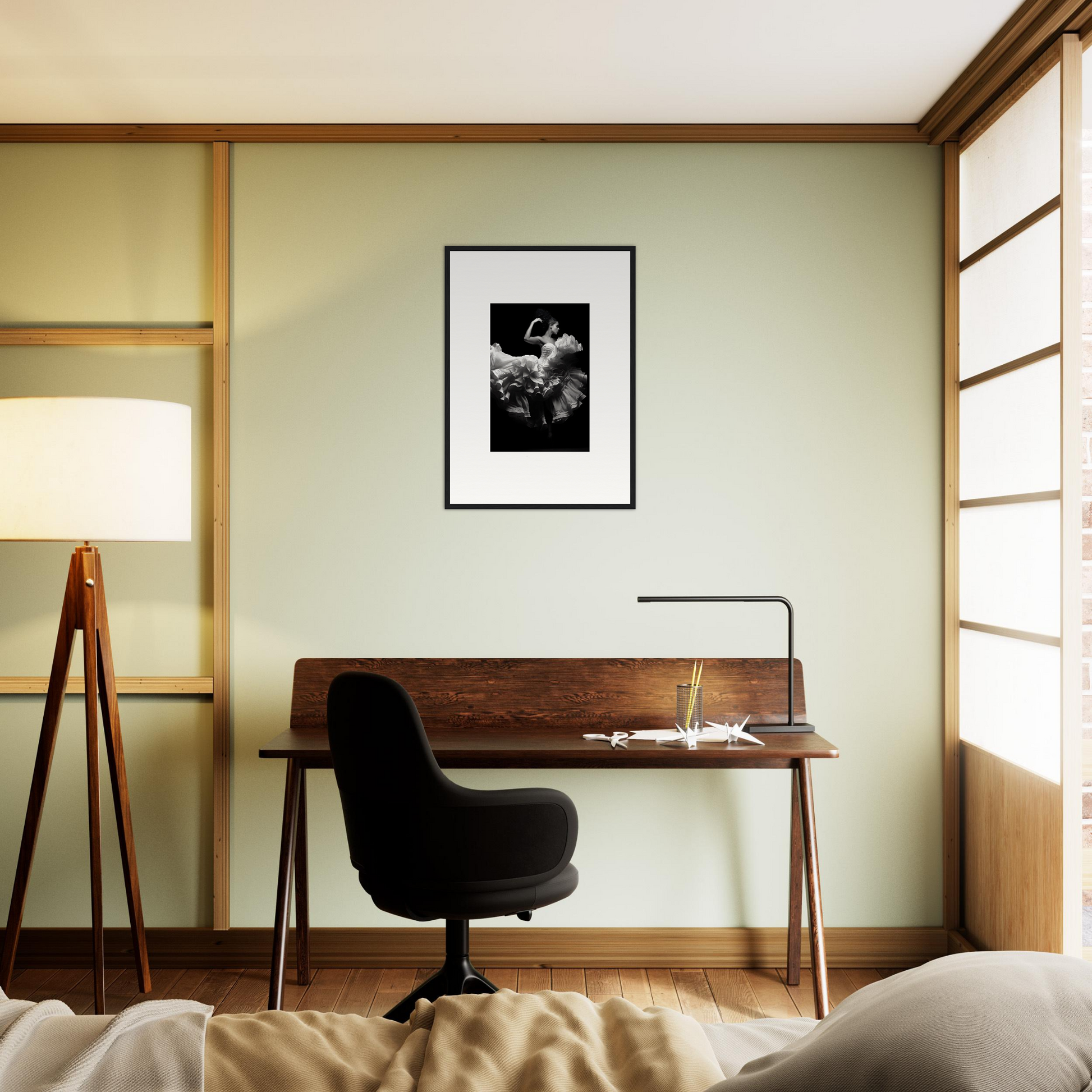 Wooden desk with a black office chair in front of it.