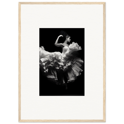 Dancer in a flowing white dress captured mid-twirl against a dark background.