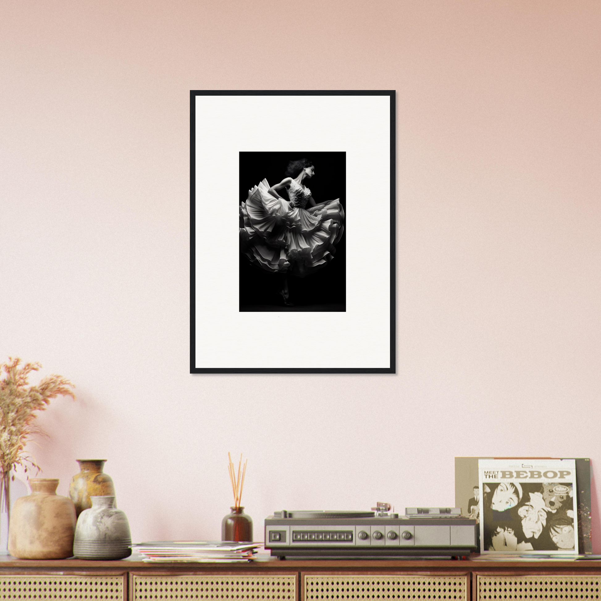 Framed black and white photograph of swirling, ethereal forms against a dark background.