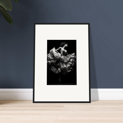 Framed black and white photograph of a dancer in flowing fabric.