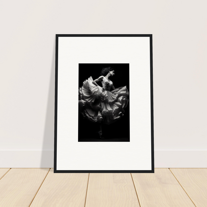 Framed black and white photograph of swirling flower petals in motion.