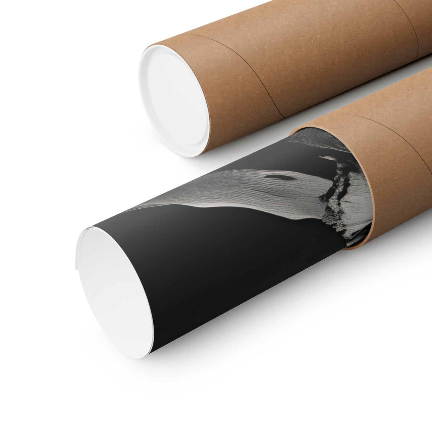 Rolled canvas or poster prints, one displaying a black and white photograph.