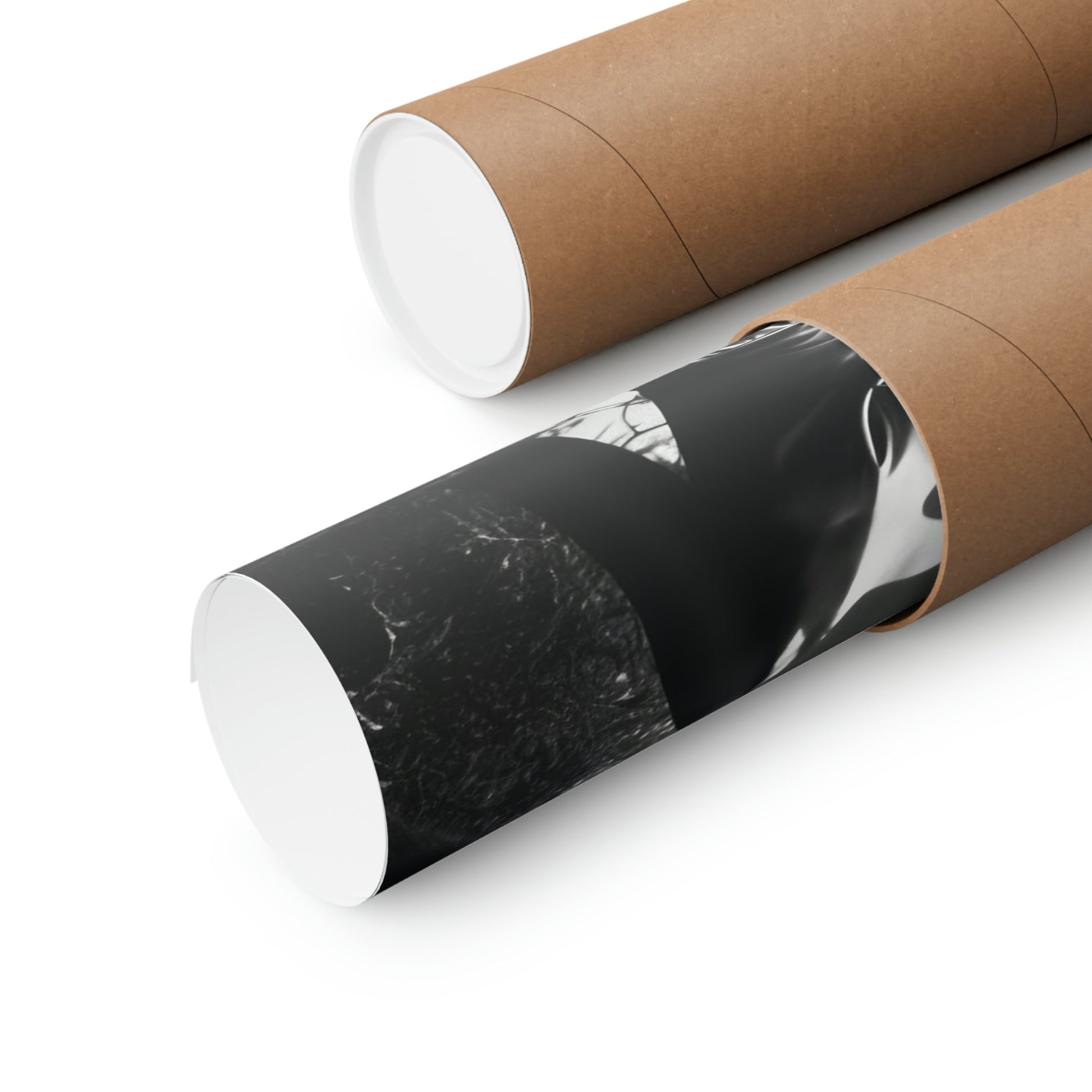 Two rolls of brown paper with black and white images