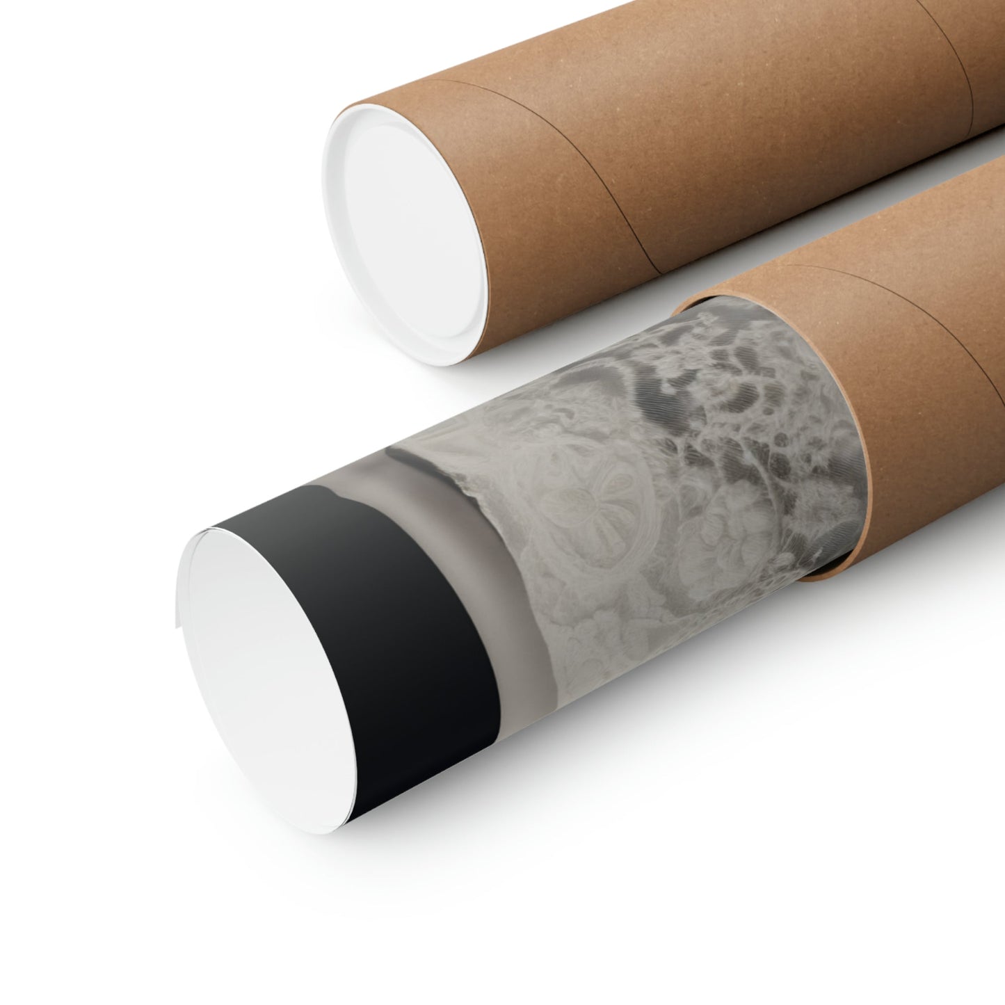 Two rolls of brown paper with black and white designs