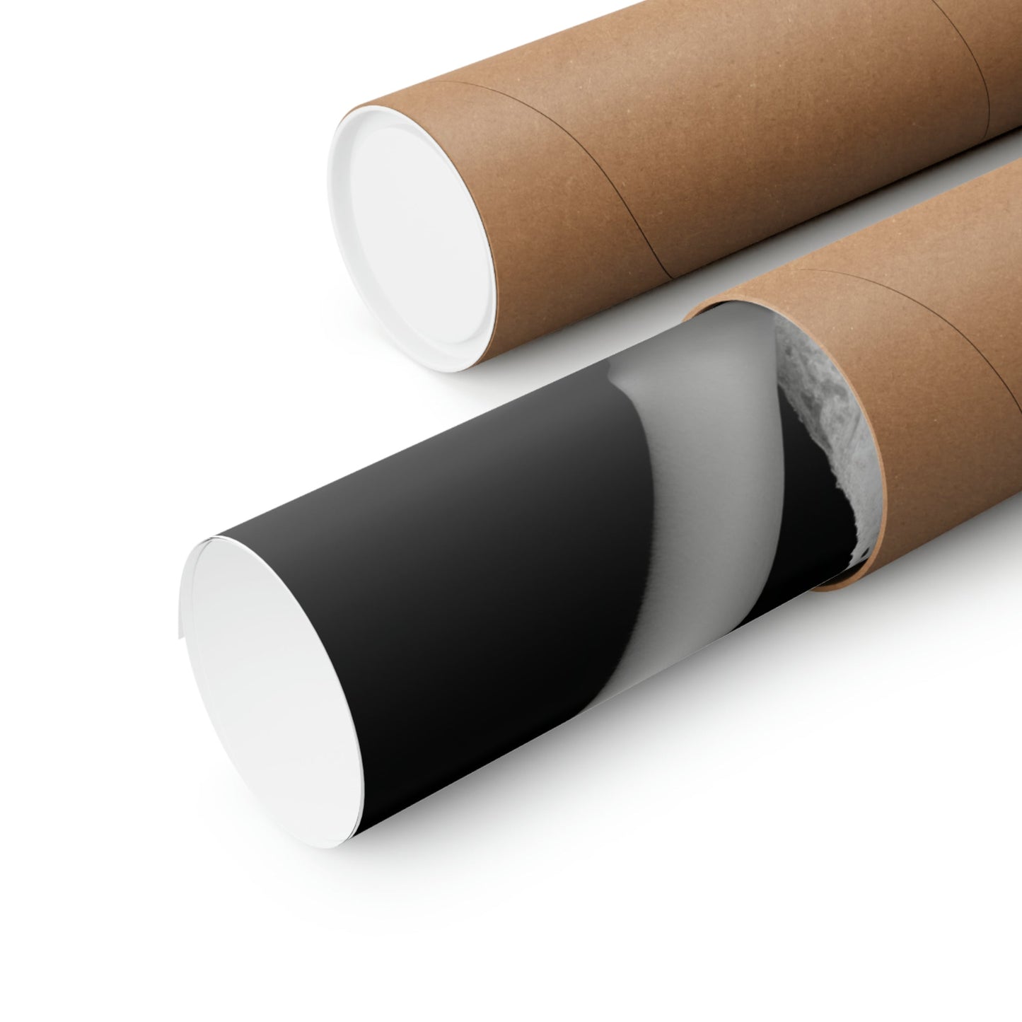 Two rolls of brown paper with black and white paper