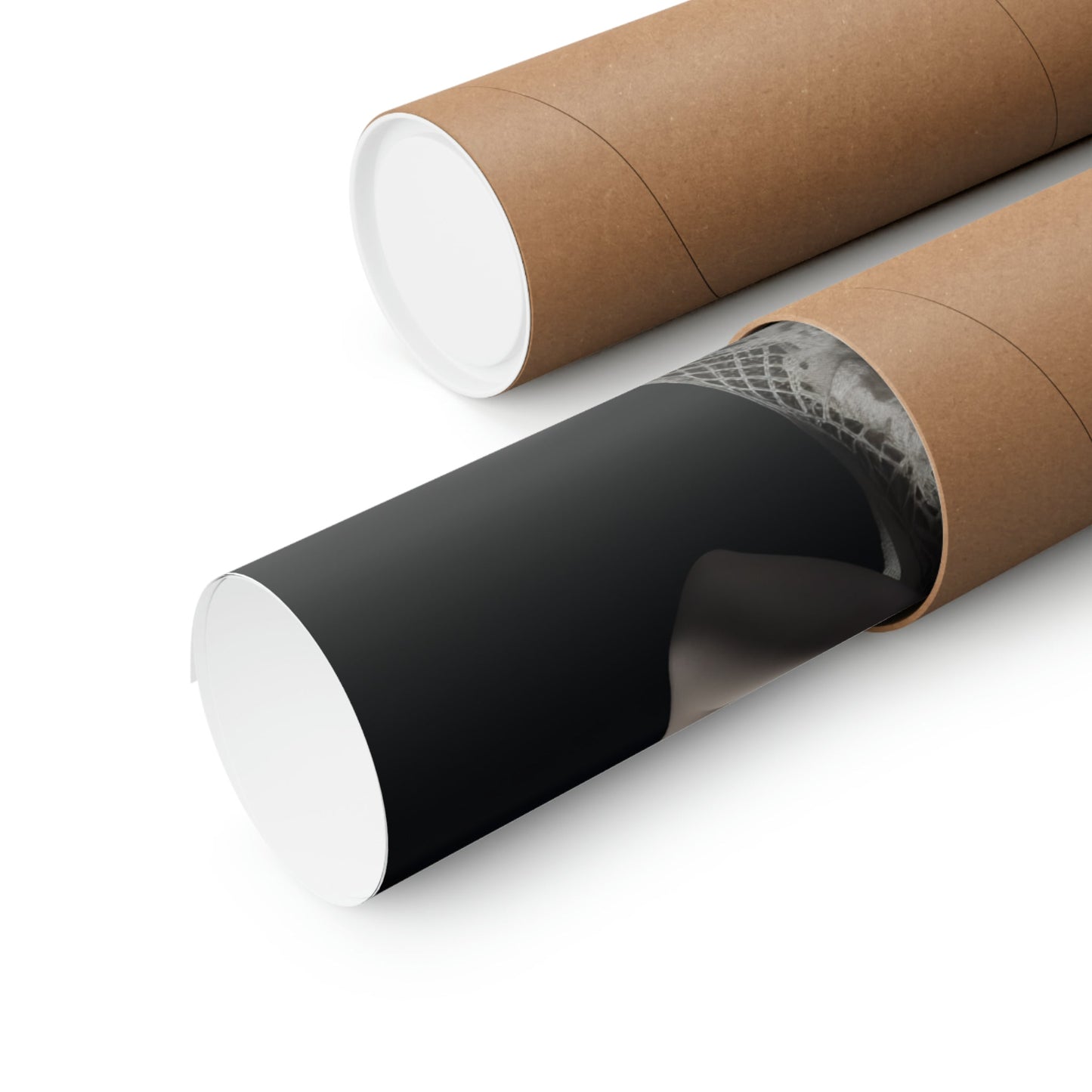 Two rolls of brown paper with black and white paper