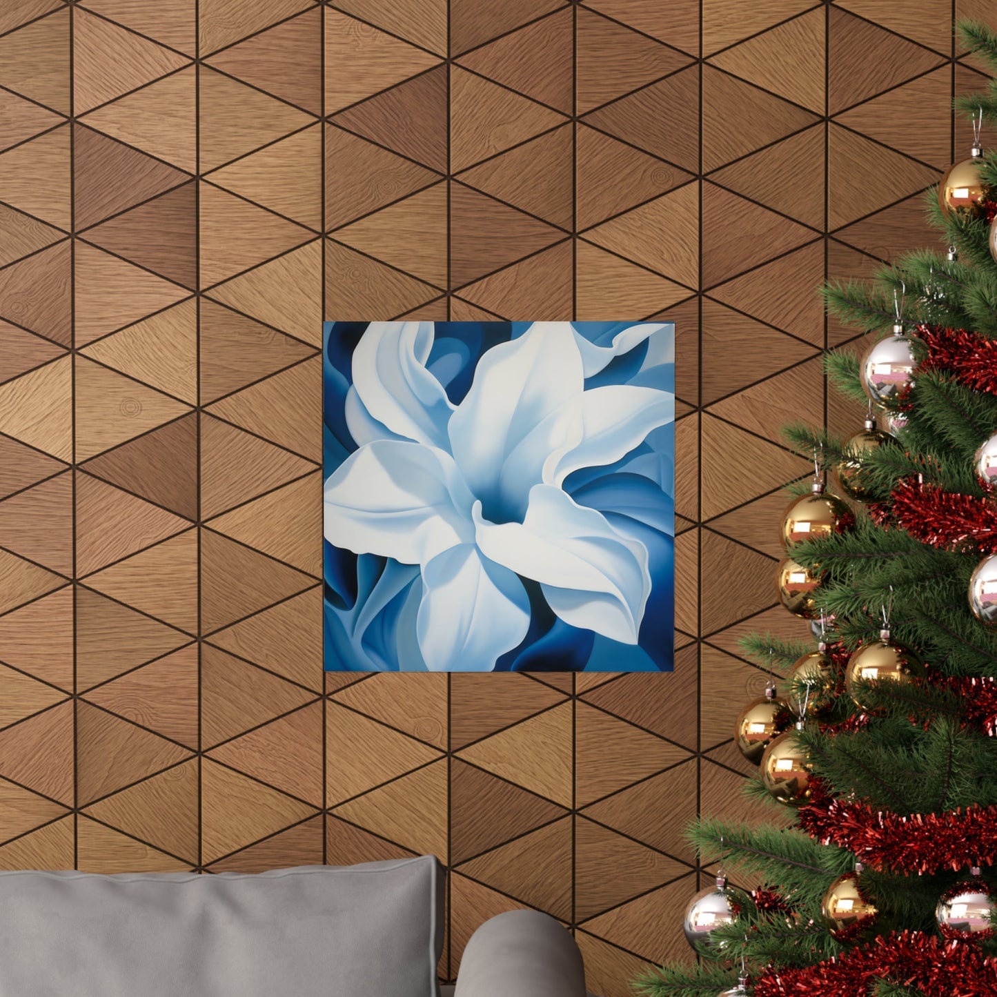 A christmas tree with a blue flower on it