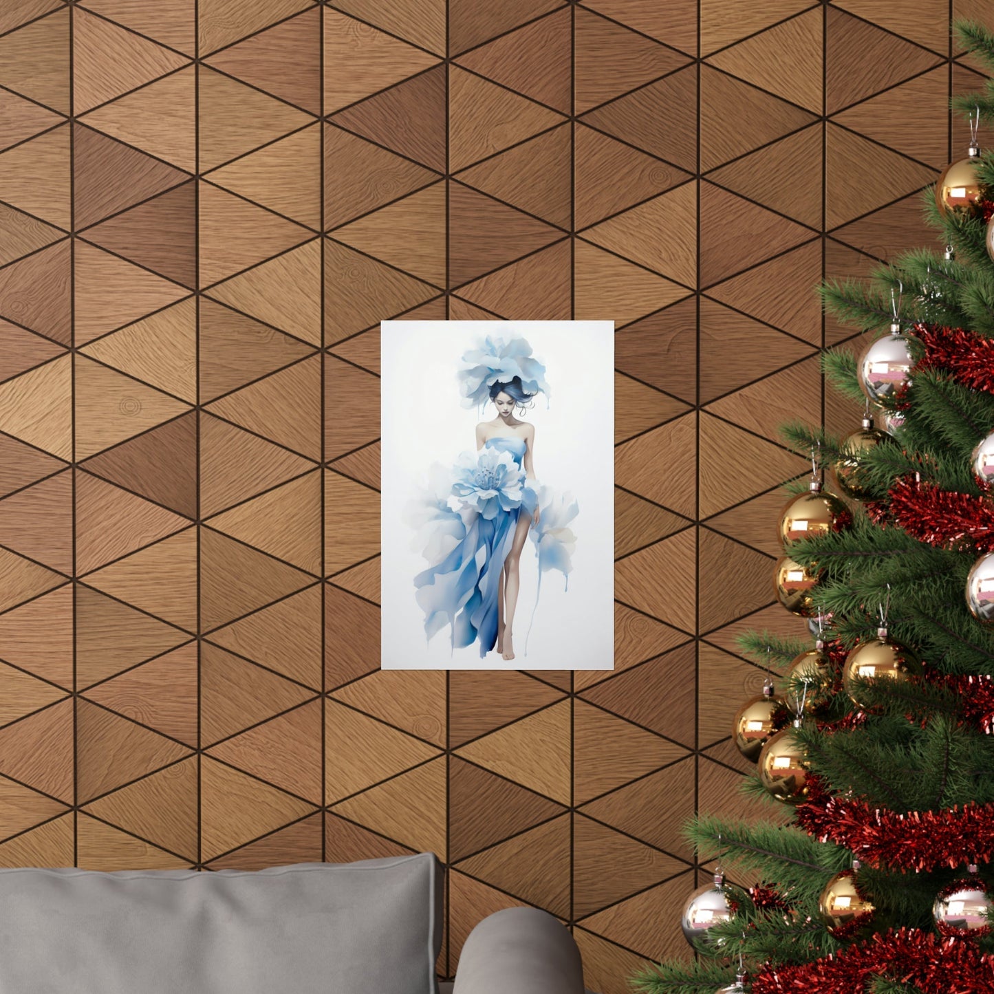 A christmas tree with a picture of a woman in a blue dress