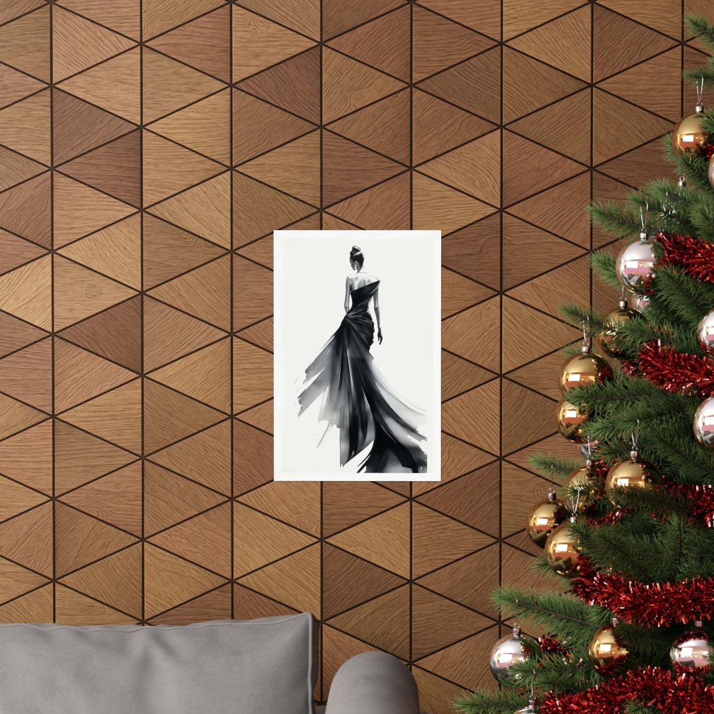 A christmas tree with a picture of a woman in a black dress