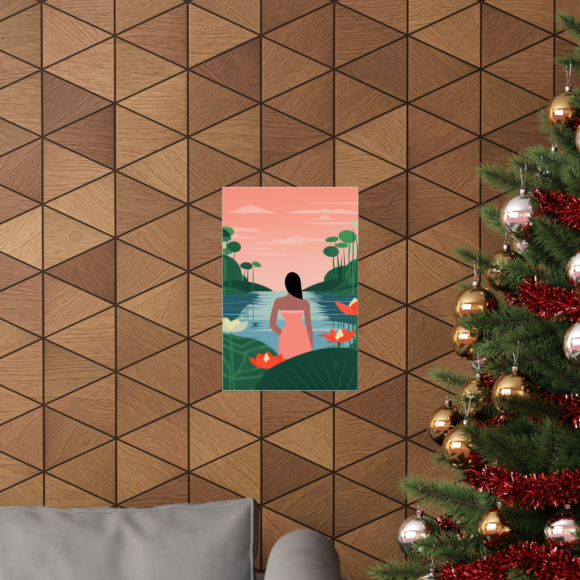 A christmas tree with a picture of a woman sitting on it