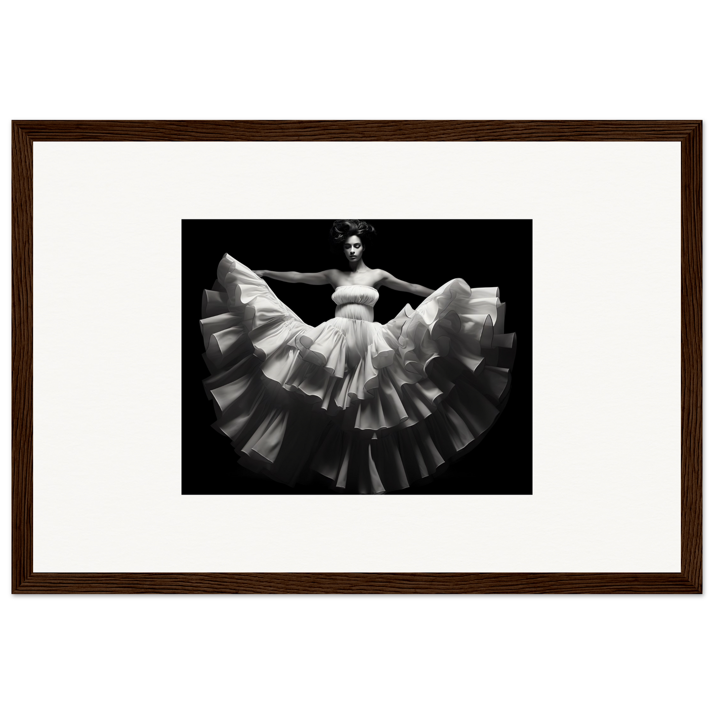 Framed black and white photograph of a dancer in a flowing white dress.