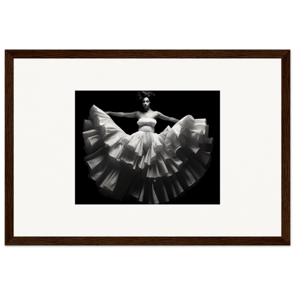 Framed black and white photograph of a dancer in a flowing white dress.