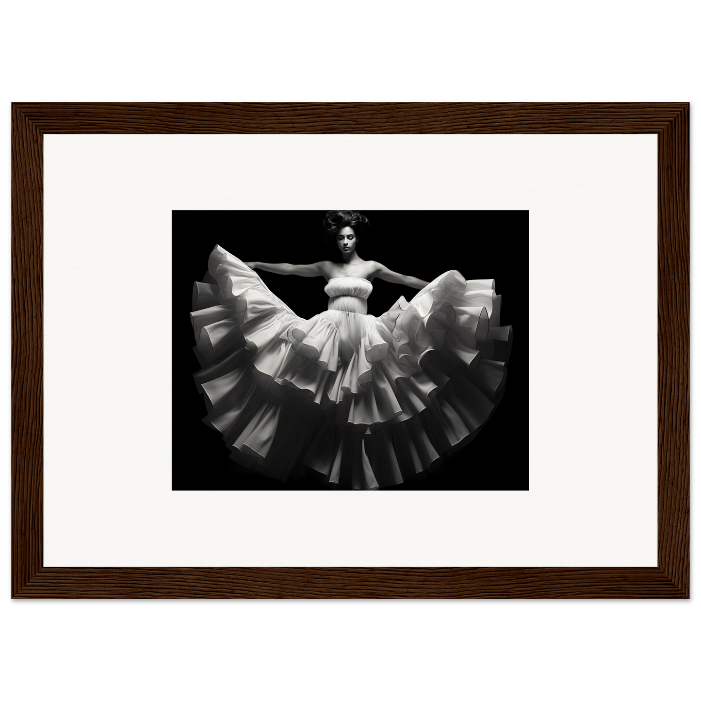 Framed black and white photograph of a dancer in a flowing, ruffled dress.